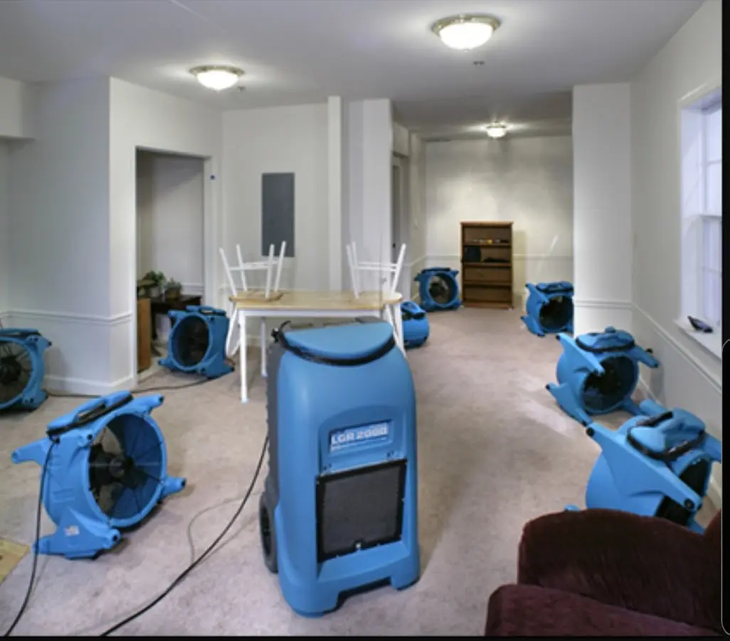 Air movers and dehumidifier setup for Water Damage Restoration in El Reno