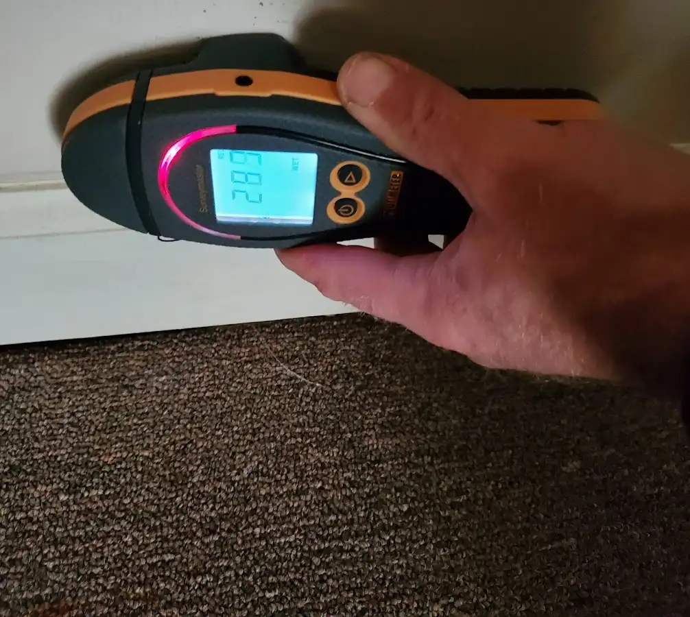 Moisture detection at baseboard during Burst Pipe Cleanup in El Reno